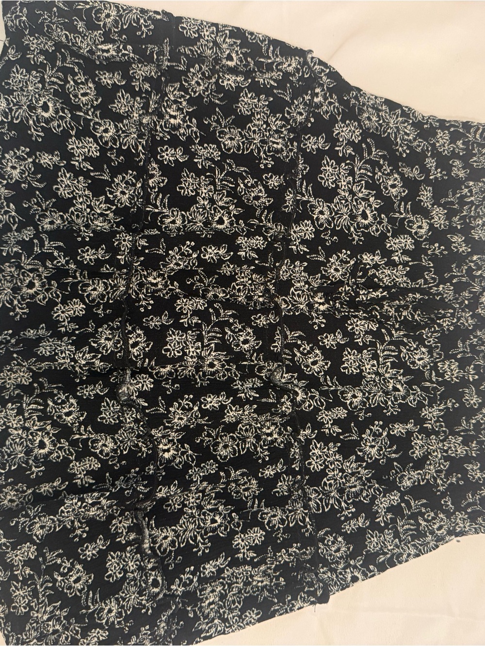 Good Luck Gem Black Mini Skirt with White Floral Pattern